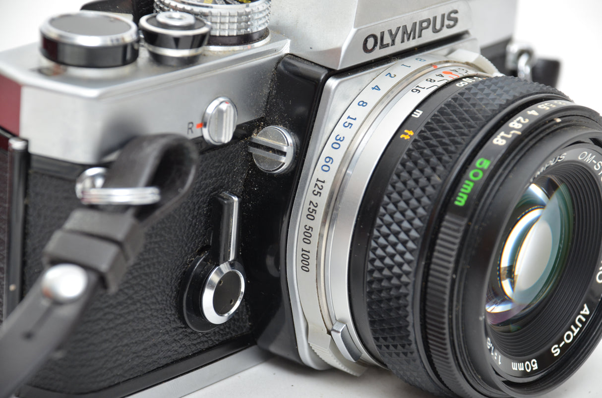 Used Olympus OM-1 SLR camera with Olympus Zuiko Auto-s 50mm f/1.8 lens
