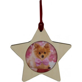 A star-shaped wooden ornament with a photo of a small, fluffy brown dog wearing a pink bow collar.