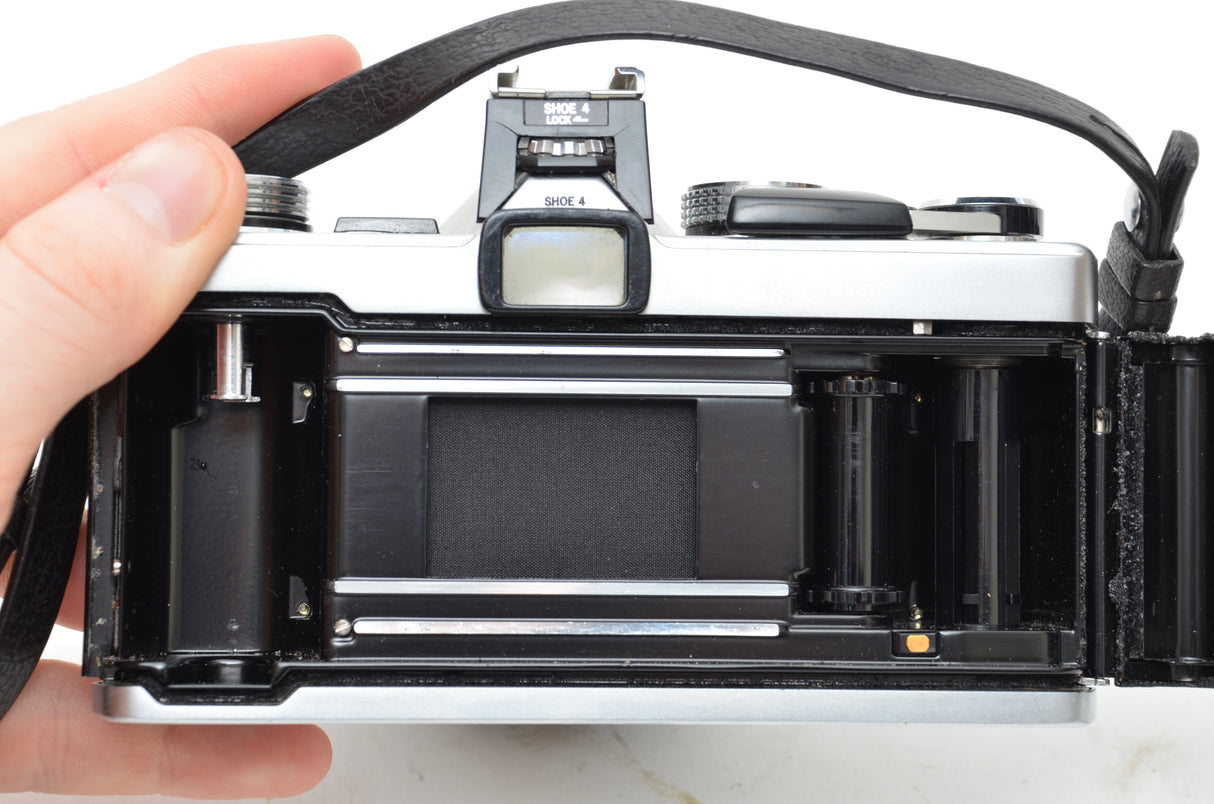 Used Olympus OM-1 SLR camera with Olympus Zuiko Auto-s 50mm f/1.8 lens