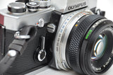Used Olympus OM-1 SLR camera with Olympus Zuiko Auto-s 50mm f/1.8 lens