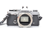 Used Olympus OM-1 SLR camera with Olympus Zuiko Auto-s 50mm f/1.8 lens