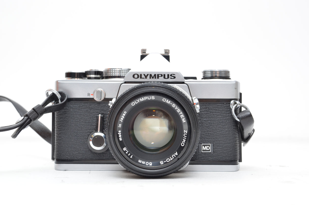 Used Olympus OM-1 SLR camera with Olympus Zuiko Auto-s 50mm f/1.8 lens