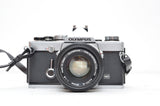 Used Olympus OM-1 SLR camera with Olympus Zuiko Auto-s 50mm f/1.8 lens
